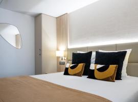 博纳基里亚德酒店，位于博讷的带停车场的酒店