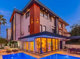 Casa Rosa Luxury Villa w heated Pool，位于贝莱克的乡村别墅