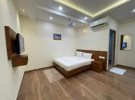 The Marina Deluxe Kozhikode - Premium Spacious AC Rooms