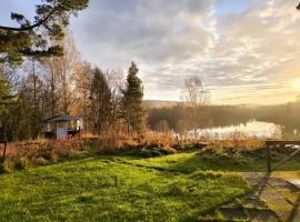 Embracing nature's Swedish house，位于卢德维卡的酒店