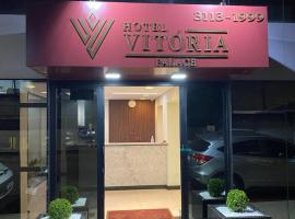 Hotel Vitoria Palace varginha，位于瓦尔任阿的酒店