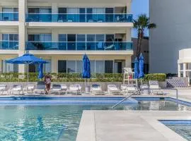 Relax in this modern ocean front condo Encantame E1404