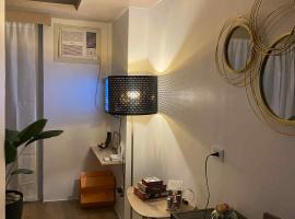 1-bedroom Modern Tropical Condo in Ortigas, Pasig，位于Wasig的酒店