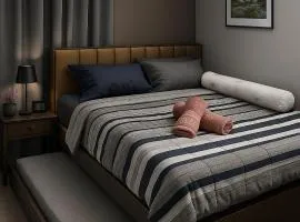 Seven-Eleven Inn 1BR Condo - Royal Oceancrest Mactan