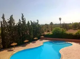 Appartement 2 chambres, piscine, vue palmeraie