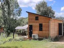 TinyHousebeiDresden mit Faßsauna Zwischen den Teichen und auf der Pferdekoppel Kaminofen Terrasse Klimaanlage