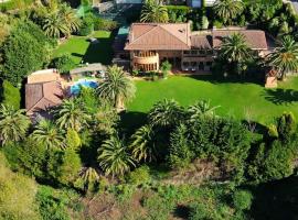 Basque Palace, Mansion con Jardín, Barbacoa, Gimnasio, Piscina, Sauna，位于蒙希亚的酒店