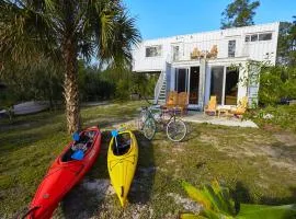 Upcycled Shipping Containers Transformed into a Glamping Home for a Unique Florida Vacation