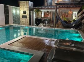 Mansão pé na areia - Arembepe，位于卡马萨里的酒店