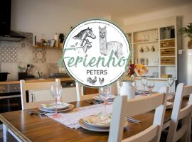 Ferienwohnung Peters (EG)，位于欣费尔德的酒店