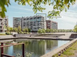 Stylish Riverfront Penthouse with Skyline View