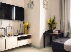 Spacious Central Davao City Getaway - Spacious Apartment with Shared Pool，位于Cabaguio的酒店