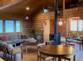 海を眺めるログハウス カマカーマAwaji