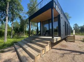 Holiday home in the middle of nature in Knared，位于Knäred的酒店