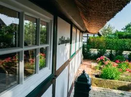 Cottage mit Kamin und Garten, seenah