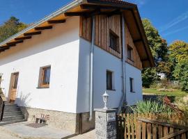 Time Out Moments Haus mit eigener Sauna，位于格拉弗瑙的酒店