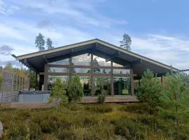 Naava Resort Luppo - Upea huvila järvinäkymällä