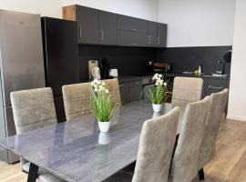 Moderne Ferienwohnungen - Service wie im Hotel，位于格平根的酒店