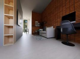 Modern apartment in Bree with parking，位于布雷的酒店