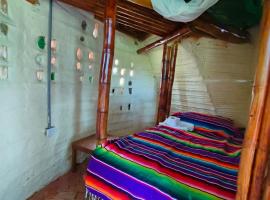 Hospedaje casa en el &Aacute;rbol，位于莫尼基拉的木屋