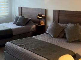 Apartahotel La Arboleda HC，位于马尼萨莱斯的住宿