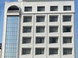 Pride Elite Dwarka Near Dwarkadhish Temple，位于德瓦尔卡的酒店