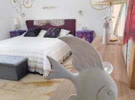 Giardino Principi Daf agi luxury Suite & jacuzzi，位于卡普尔索的酒店