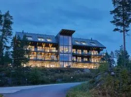 Naava Chalet 303 Loft - Kaksikerroksinen lasiseinähuoneisto järvinäköalalla