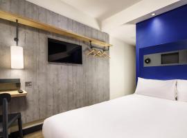 ibis budget Manchester Airport T2，位于霍尔的酒店