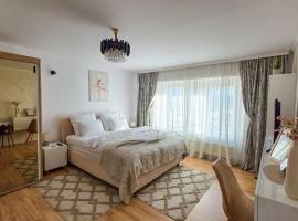 Central Modern View- unitate autorizată de Ministerul Turismului，位于拉姆尼库沃尔恰的自助式住宿