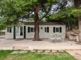 Family mobile home solar powered near the sea and the airport