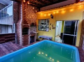 Cantinho Feliz de Muriqui / Casa amarela