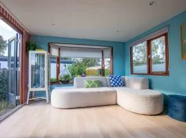 Kleurrijk boshuisje Sole op de Veluwe