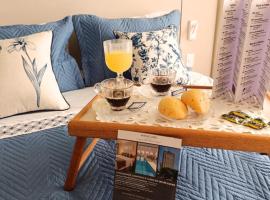 Hotel Aeroporto Stay Here，位于瓜鲁柳斯的酒店