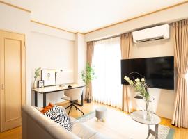 The Global West，位于新居滨市的酒店