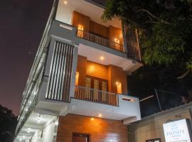 Infinity Rooms Kazhakkoottam Technopark，位于特里凡得琅的酒店