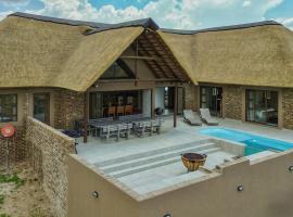 Pezulu Lodge，位于沃姆巴斯的酒店