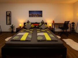Homefeld Suite - Elegante und moderne Ferienwohnung zentral in Hünfeld bei Fulda mit Küche, kostenlosem Parkplatz und WLAN，位于欣费尔德的酒店