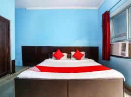 OYO Om Hotel，位于尼玛纳的酒店