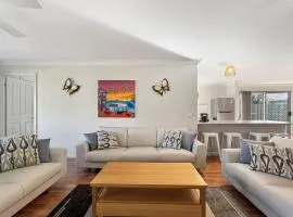 Spacious 4-Bed Home 2-Min to the Beach