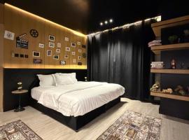 مدن هاوس ودخـول ذاتي，位于哈伊勒的带停车场的酒店