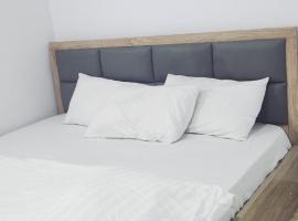 Dominion Apartment and Guest House，位于Osese的酒店