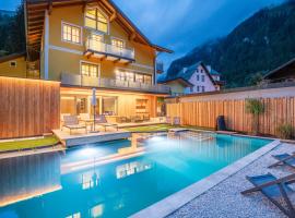 AlpinSpa zur Post Apartment - Bergbahn im Sommer 2026 inklusive，位于巴德加斯坦的带热水浴缸的酒店