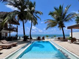 Mango Beach House，位于江比阿的酒店