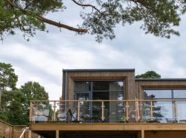 Hills Lodge at Hills Golf and Sports Club，位于默恩达尔的酒店