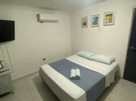 Habitaci&oacute;n cerca al aeropuerto 2，位于卡塔赫纳的带停车场的酒店