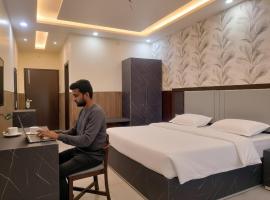 Cottage Club Inn，位于阿尔莫拉的酒店