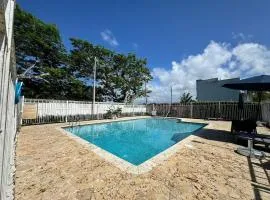 Walk to Beach • Pool • Balcony views + BBQ Grill