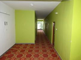 Hotel O The Glide Inn Hotel & Restaurant，位于达兰萨拉的酒店