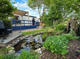 Cozy escape near Den Bosch - 4 PS chalet met veel privacy en rust!，位于Lith的酒店